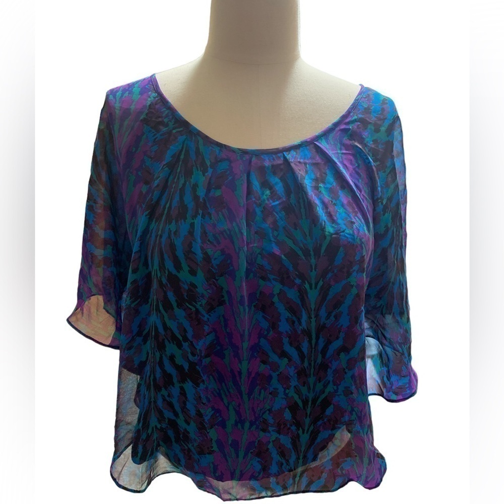 Express blue, black, and purple color flutter top size M